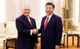 China’s President Xi Jinping (R) shakes hands with U.S. State of Secretary, Rex Tillerson at the Great Hall of the People in Beijing, China, March 19, 2017. REUTERS/Thomas Peter