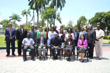 The Mayors and Deputy Mayors with (seated from left) Permanent Secretary in the Ministry of Communities Emile McGarrel, Minister of Communities Ronald Bulkan, President David Granger, and Ministers within the Ministry of Communities Valerie Adams-Patterson and Dawn Hastings-Williams after they were swearing-in ceremony at State House yesterday. (See story on page 16) (Photo by Keno George)