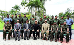 President David Granger (seated centre) poses with the newly commissioned officers. The President is accompanied by (from left) Inspector General,  Col. Nazrul Husain; Attorney General and Minister of Legal Affairs, . Basil Williams. S.C;, Acting Prime Minister Khemraj Ramjattan; Minister of State,  Joseph Harmon; Chief of Staff of the GDF, Brigadier Patrick West and SOC 49 Course Officer, Major L. Benons.  (Ministry of the Presidency photo)