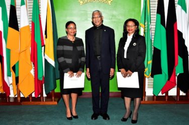 President David Granger with acting Chancellor Yonette Cummings-Edwards (right) and acting Chief Justice Roxane George-Wiltshire