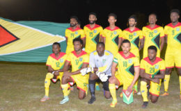 The Golden Jaguars Team before the commencement of their fixture against Martinique. (Orlando Charles photo)