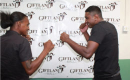 Keeve Allicock (right) and Imran ‘Magic’ Khan square off following their contract signing last week. The pair will match gloves on the ‘Locked and Loaded’ card at the Giftland Mall on April 9.