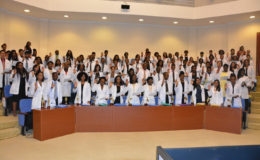 Recent Cuba-trained doctors taking the Hippocratic Oath last year at their graduation ceremony at the Arthur Chung Convention Centre