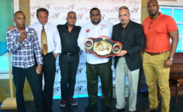  Organisers of the ‘Locked and Loaded’ card along with boxer, Dexter Marques pose for a photo following yesterday’s press briefing at Giftland Mall. In the photo along with Marques (extreme left) are GBBC President, Peter Abdool, Roy Beepat (President of Giftland Mall), Jason Fraser, President of the TTMMAF and Michael and Gavin Singh.
