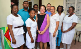 First Lady,  Sandra Granger (centre) and the nurses and doctors attached to the Agricola Health Centre, East Bank Demerara. (Ministry of the Presidency photo)
