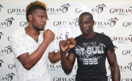 Edmond DeClou (left) squares up against Winston Pompey following the contract signing recently. 