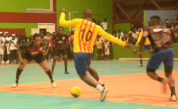 Flashback-Selwyn ‘Nick’ Williams (center) attacking the Bent Street backline moments before the equalizing goal during their semi-final fixture in the Petra Organization Futsal Championship at the National Gymnasium (Photo Orlando Charles)