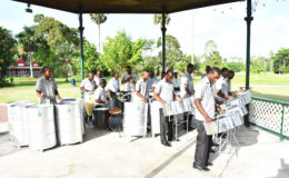 Easter concert: The Guyana Police Force steelband playing in the Botanical Gardens yesterday.