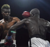 Edmond DeClou connects to the face of Winston Pompey during their super middleweight contest. 