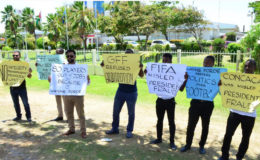 FLASHBACK! Members of the Georgetown Football Club (GFC) protesting outside the Pegasus Hotel in Kingston during the press conference held by the Guyana Football federation (GFF) for  FIFA President Gianni Infantino on his recent visit to Guyana.