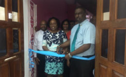 The Insurance Association of Guyana (IAG), formally opened its first office on Friday, on the first floor of the building that houses P and P Insurance at the corner of King Street and North Road, opposite the St George’s Cathedral. Speaking at the opening ceremony, President of the Association Yogindra Arjune, who described the opening as significant, said that though the association has been around for years, the office was at the homes of various secretaries. He said there was need for an office and that need has been met. Cutting the ceremonial ribbon are IAG Regulator Tracey Gibson and President of IAG Yogindra Arjune.  (Photo by David Papannah) 