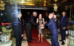 President David Granger and First Lady Mrs. Sandra Granger are greeted by President of the ACEG, Mr. Kevin Liu upon their arrival at the New Thriving Restaurant on Main Street 