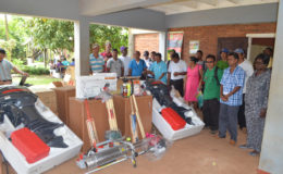 Residents of the various communities in Mabaruma standing alongside the equipment they received from the Ministry of Indigenous Peoples’ Affairs. (GINA photo)