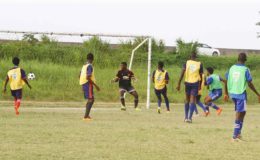 Morgan Learning Centre’s David Coates (2nd from right) scoring one of his four goals against Carmel Secondary during their quarterfinal fixture at the Ministry of Education ground in the Milo Secondary School Football Championships. (Orlando Charles photo)
