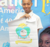 St Joseph High School fifth former Precious Barrow holding up her drawing.