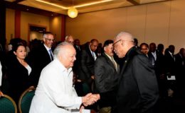 President David Granger (right) greeting veteran Guyanese diplomat and former Minister of Foreign Affairs, Sir Shridath Ramphal (Ministry of the Presidency photo)
