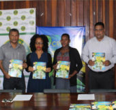 Members of the Guyana Cricket Board pose for a photo with the 2017 edition of the Board’s “The Guyanese Cricketer” magazine. From left to right – President (acting); Fizul Bacchus, Honorary Secretary; Anand Sanasie, Avee Fedee - Grimmond, Kavita Yadram, Treasurer; Anand Kalladeen and Territorial Developmental Officer, Colin Stuart. (Royston Alkins photo)