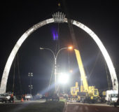 The arch  last night at Cummings Lodge after works resumed. Stabroek News understands that the contractor has to install covers with LED lighting. Project Manager Lawrence Mangar said that the installation of the covers would be done at a later date. (Photo by Keno George)