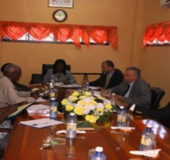 In picture, General Manager (Ag), Holly Greaves (head of table) ILO representatives Ariel Pino and Lou Enoff (left of NIS GM) along with members of the NIS Board during their meeting.  (NIS photo)
