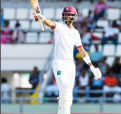  Batsman Roston Chase salutes the crowd after reaching his half-century against Pakistan at Windsor Park on Friday. (Photo courtesy WICB Media)
