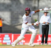 STANDING TALL: Roston Chase celebrates another landmark during his superb unbeaten 101 on the final day of the third Test against Pakistan yesterday. (Photo courtesy WICB Media)