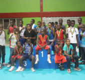 Some of the boxers of the Caribbean’s Schoolboys and Juniors tournament pose for a photo opportunity after the three-night tournament concluded at the National Gymnasium on Sunday.