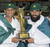 Captain Misbah-ul-Haq (right) poses with the series trophy with the also retiring Younis Khan following last Sunday’s series win in Dominica. (Photo courtesy WICB Media)