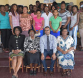 Some of the participants (standing) at the opening of the 16th Self Reliance and Success in Business Workshop. Pictured seated from left to right are: Lieutenant Colonel (ret’d) Yvonne Smith, Confidential Secretary to the First Lady; Genevieve Allen, Regional Chairman, Demerara-Mahaica;Yohann Sanjay Pooran, Facilitator, Interweave Solutions and  Andriea Marks, Sophia Community Coordinator. (Ministry of the Presidency photo)