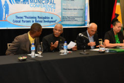 President David Granger in discussion with Mayor of Linden Carwyn Holland (at left) at the Inaugural Municipal Conference 2017 yesterday. At the president’s right are Minister of Communities Ronald Bulkan and Georgetown Mayor Patricia Chase-Green. (Ministry of the Presidency photo) 