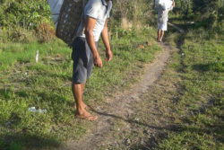 Toshao of Chenapau Village, Edward McGarrell transporting emergency supplies to residents using the traditional Indigenous Warishi. (Photo courtesy Edward McGarrell)