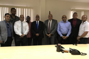 Minister of Natural Resources, Raphael Trotman (fourth from right) and Manniram Prashad (fifth from right) with members of the association.