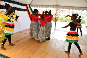 Region Three flag-raising: Students of the Good Intent Culture Group performing a dance at the Region Three flag-raising yesterday. (Ministry of the Presidency photo).
