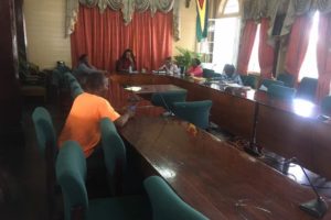 Members of the city’s renegotiating committee awaiting public transport operators in the almost empty Council Chambers on Wednesday. 