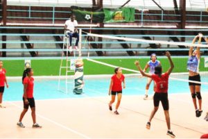 Action in the DVA Female Volleyball League as  Vanguard VC players (right) goes up to block a strike from  a Pakuri Warriors  player. Vanguard won the match by three sets to one.
