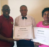 Certified ones! Guyana’s first International Boxing Association (AIBA) certified referee/judges, Ramona Agard and Richard Braithwaite receives their certificates yesterday from President of the Guyana Boxing Association (GBA), Steve Ninvalle.