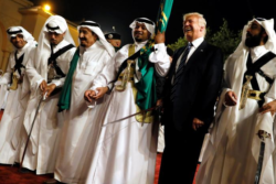 
U.S. President Donald Trump dances with a sword as he arrives to a welcome ceremony by Saudi Arabia's King Salman bin Abdulaziz Al Saud at Al Murabba Palace in Riyadh, Saudi Arabia May 20, 2017. REUTERS/Jonathan Ernst
