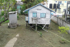 A Bartica resident’s yard, which was flooded on Tuesday, is now completely dry.
