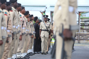 Outgoing head of the Presidential Guard, Assistant Commissioner of Police Brian Joseph inspecting the Guard of Honour at a farewell parade for him yesterday at D’Urban Park. See story on centre pages. (Photo by Keno George)  