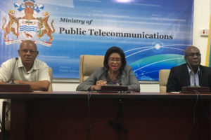 From right are Presidential Advisor on e-Governance Floyd Levi; Minister of Public Telecommunications Catherine Hughes and Director of Project Management and Community Development Phillip Walcott yesterday at the Ministry of Public Telecommunications mid-year press conference.
