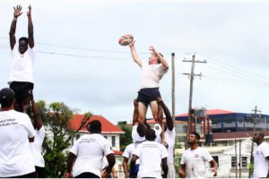 The visiting Trinidad and Tobago rugby team  doing line out drills yesterday at the Parade Ground. (Orlando Charles photo)