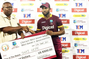 Shai Hope receives his Man-of-the-Match award for his unbeaten innings of 48.