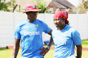 West Indies Women’s captain Stafanie Taylor chats with head coach Vasbert Drakes during a training session. (Photo courtesy CWI Media) 