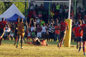 FLASHBACK! Guyana’s Avery Corbin scores a try in the game against Trinidad and Tobago. (Orlando Charles photo)