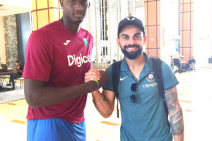 West Indies captain Jason Holder meets Virat Kohli as the Indian team arrived in Trinidad and Tobago for the upcoming one-day series which commences Friday. (Photo courtesy Cricket West Indies)  