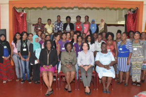 First Lady, Sandra Granger (seated, third from left) is flanked by, from left to right, Lieutenant Colonel (ret’d) Yvonne Smith; Facilitator of the workshop Paulette Bollers and Co-Facilitator  Ninian Blair. The participants are pictured standing. (Ministry of the Presidency photo)