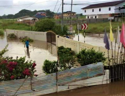 This image provided by Indira Mulligan shows the extent of the flooding at Madras Road, St Helena.