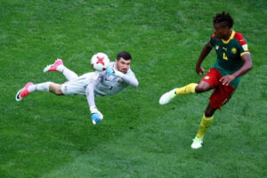 Cameroon v Australia, Saint Petersburg Stadium, St. Petersburg, Russia. Australia’s Mathew Ryan in action with Cameroon’s Adolphe Teikeu (REUTERS/Kai Pfaffenbach)