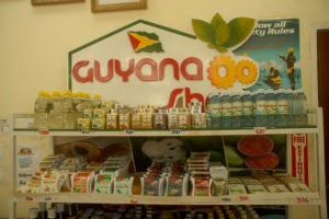   Local agro-processed condiments on the shelves at the Guyana Shop