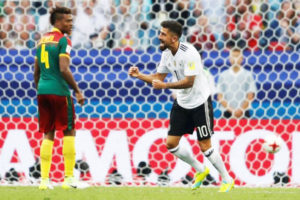 YESS! Germany’s Kerem Demirbay celebrates scoring their first goal as Cameroon’s Adolphe Teikeu looks dejected REUTERS/Carl Recine