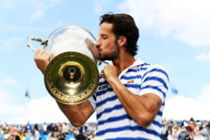 Spain’s Feliciano Lopez celebrates by kissing the trophy after winning the final against Croatia’s Marin Cilic yesterday. Reuters/Tony O’Brien